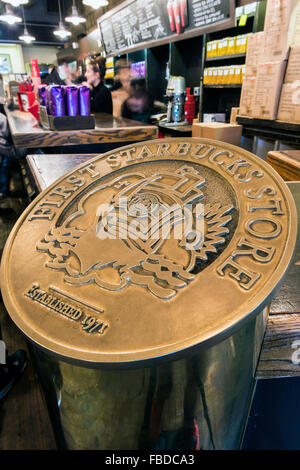 Plaque celebrating the first Starbucks store established in 1971 at Pike Place Market, Seattle, Washington, USA Stock Photo