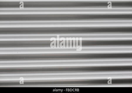close up of aluminum metal garage door backdrop Stock Photo