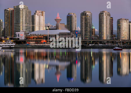 Downtown skyline reflected into the False Creek at sunrise, Vancouver, British Columbia, Canada Stock Photo