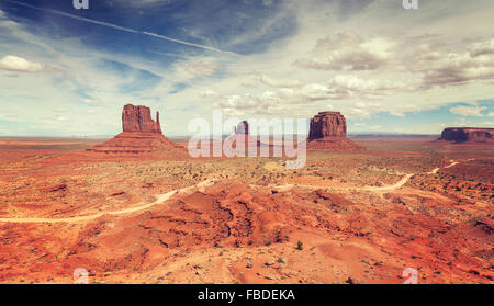 Vintage stylized panoramic view of Monument Valley, USA. Stock Photo