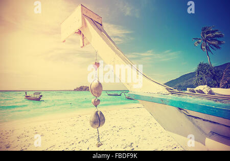 Retro stylized tropical beach, summer holidays concept. Stock Photo