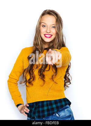 happy young woman or teen pointing finger on you Stock Photo