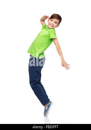 smiling boy having fun or dancing Stock Photo