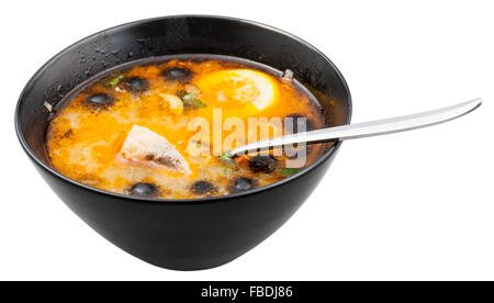 bowl with Solyanka russian traditional fat fish soup isolated on white background Stock Photo