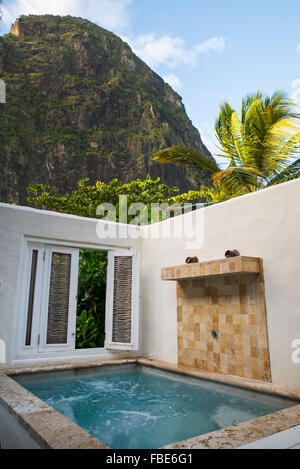 Hot tub in bungalow at Sugar Beach resort, with the Petit Piton, St Lucia Stock Photo
