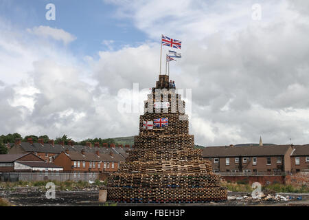 Loyalist bonfire in Lanark Way Belfast. Bonfires are traditionally lit on the 11th July in loyalist areas; history states that t Stock Photo