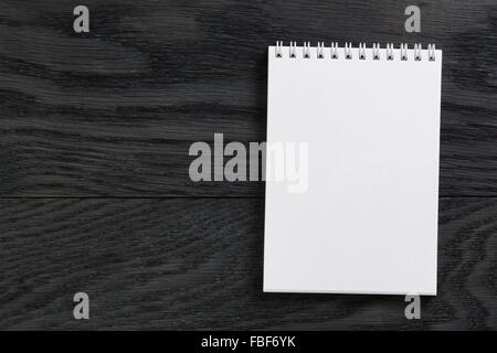 simple blank notepad on rustic wood table Stock Photo