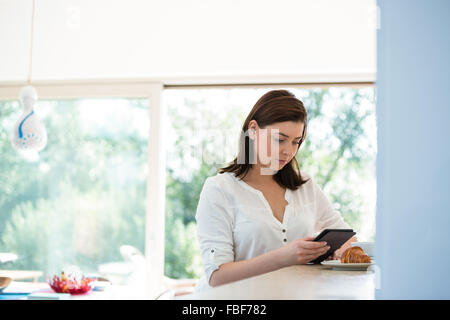 Woman using tablet computer Stock Photo
