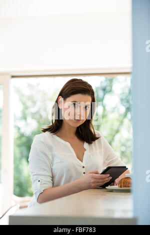 Woman using tablet computer Stock Photo