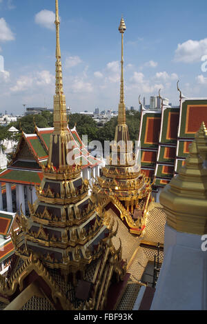 Spires of Loha Prasat (Iron Palace), Wat Ratchanatdaram temple complex, Bangkok, Thailand, Asia. Stock Photo