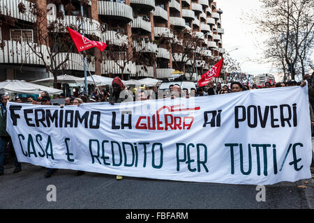 Rome, Italy. 15th Jan, 2016. 'Housing rights' activists take part in a demonstration to protest against forced housing evictions in Rome. Thousands of housing rights activists gathered in Rome to protest against forced housing evictions, to ask for the respect of accommodation right and use more public funds to help people without homes or those who cannot pay their rent. Credit:  Giuseppe Ciccia/Pacific Press/Alamy Live News Stock Photo