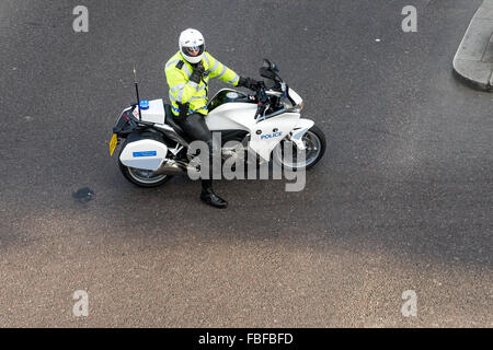 Metropoliatan Police traffic officer clearing the way for a VIP Stock Photo