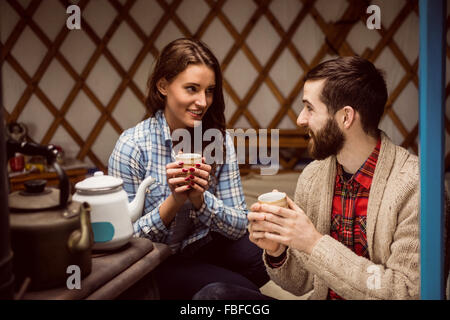 Couple talking and drinking tea Stock Photo