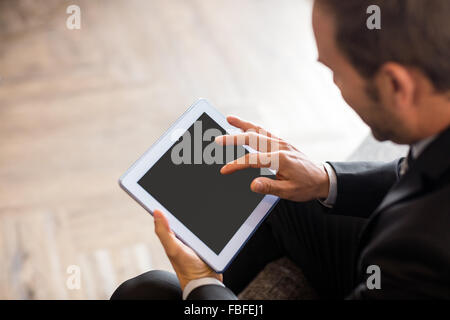 Businessman using tablet Stock Photo