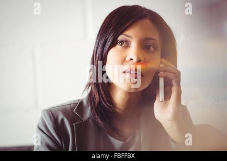 Businesswoman calling on the phone Stock Photo