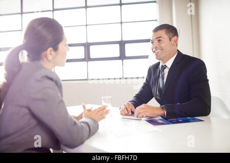 Business people having a conversation Stock Photo