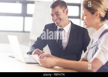 Business people working on laptop Stock Photo