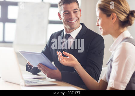 Business people using laptop and tablet Stock Photo