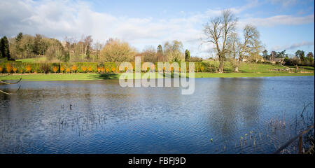 Frozen Flood Water, The river Coln in Quenington, Gloucestershire, England has flooded into the adjacent field Stock Photo