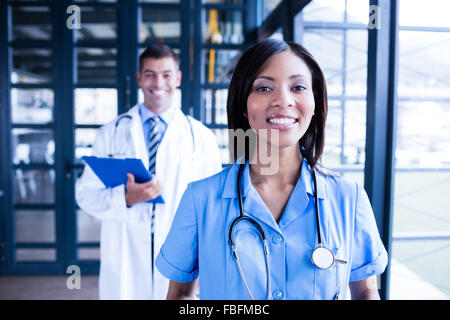 Nurse and doctor smiling Stock Photo