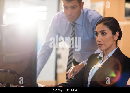 Business people working on computer Stock Photo