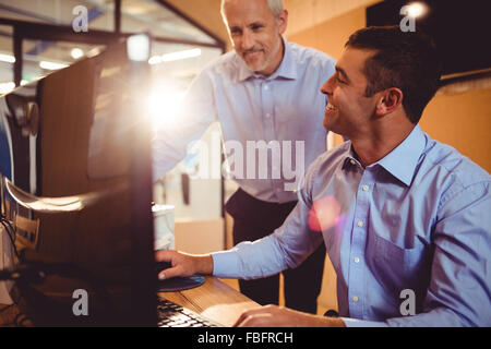 Business people working on computer Stock Photo