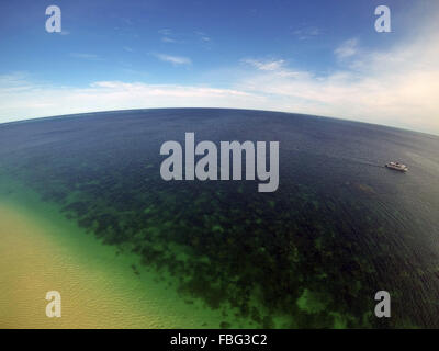 Aerial view of corals and boat in Coral Bay, Ningaloo Reef Marine Park, Western Australia. No PR Stock Photo