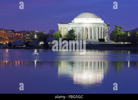 Colorful sunrise over Tidal Basin during cherry blossom festival in Washington DC, USA. Stock Photo