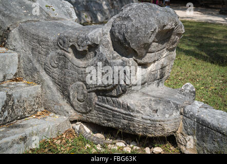 Carved Mayan statue of a Jaguar head on the Chichen Itza site in Yucatan, Mexico- A UNESCO world heritage site. Stock Photo