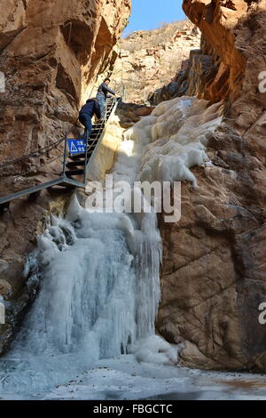 Shijiazhuang, China's Hebei Province. 15th Jan, 2016. People visit a frozen waterfall at the Sangganhe Grand Canyon in Xuanhua County, north China's Hebei Province, Jan. 15, 2016. Credit:  Yang Shiyao/Xinhua/Alamy Live News Stock Photo