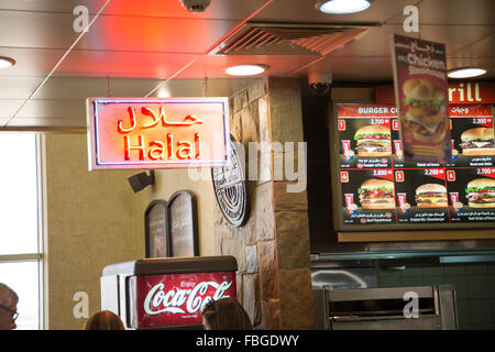 Neon sign for Halal food, Seeb International Airport, Muscat, Oman ...