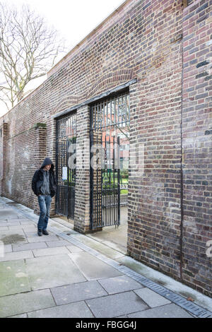 Site of the former Marshalsea Prison - The surviving remains of the perimeter wall and gates of the notorious prison in Southwark Stock Photo