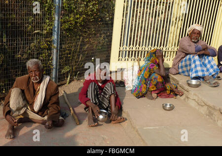 Beggars Sitting Outside a Temple in India Stock Photo