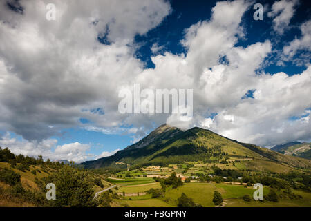 The mountains of the Cuchon and Petite Autane with the village of Les Faix,  Champsaur, French Alps in summer. Hautes-Alpes Stock Photo