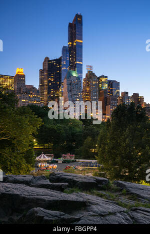 Twilight view of Central Park South skyscrapers including One57, Essex House and the Hampshire House. Manhattan, New York City Stock Photo