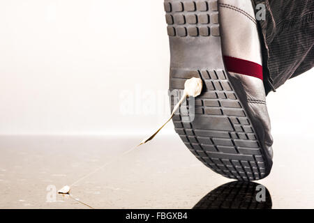 Chewing gum on the shoe, kicked in, crap, damn, annoying nuisance, waste rubber, stick, stick, studio production. shoe, gum, Stock Photo