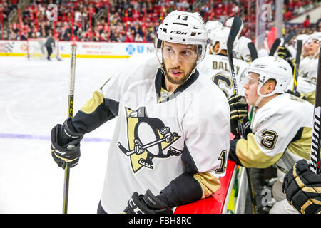 Pittsburgh Penguins center Nick Bonino (13) during the NHL game between the Pittsburgh Penguins and the Carolina Hurricanes at the PNC Arena. Stock Photo