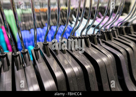Empty Hangers in a Retail Clothing Store Display, USA Stock Photo
