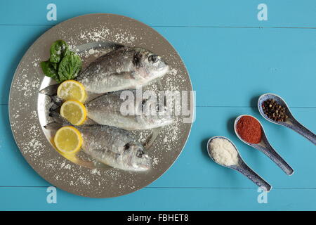 gilthead seasoned with salt Stock Photo