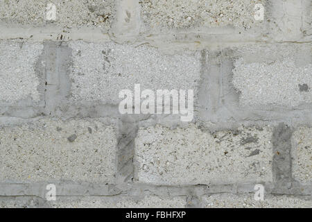 Background from slag stones. The wall put from slag stone. Stock Photo