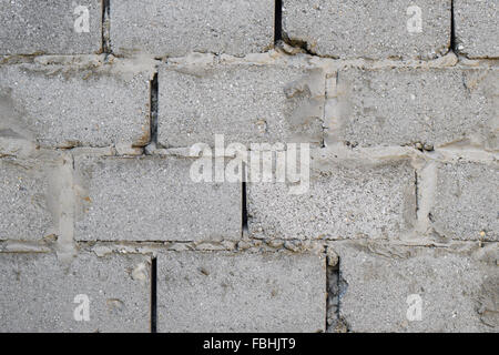 Background from slag stones. The wall put from slag stone. Stock Photo