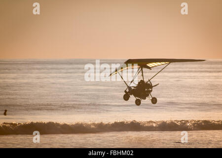 Fly in a Hang gliding in Dominical beach, Costa Rica Stock Photo