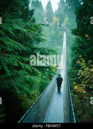 The Capilano Suspension Bridge, a popular tourist attraction at Capilano Suspension Bridge Park in North Vancouver, Canada. Stock Photo