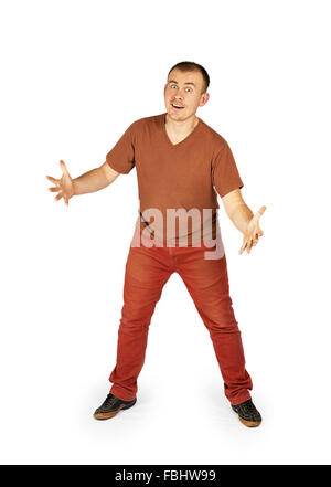 Surprised man with his hands apart isolated on white background Stock Photo