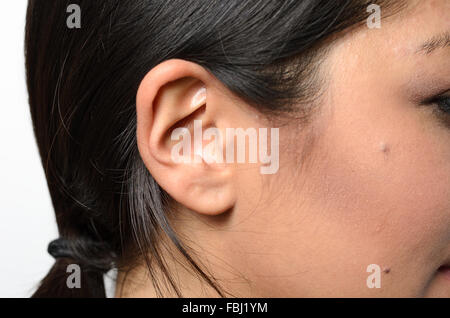Close up of the Ear of a Young Woman Stock Photo