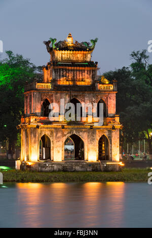 Thap Rua (Turtle Tower) lit up in Hoam Kien Lake, Hanoi, Vietnam Stock Photo