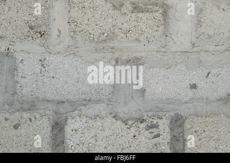 Background from slag stones. The wall put from slag stone. Stock Photo