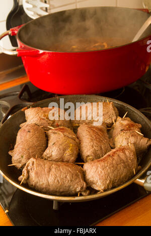Rouladen in a roasting dish Stock Photo