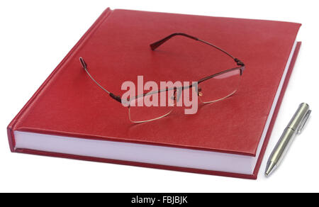 Maroon colored thesis paper with spectacles over white background Stock Photo