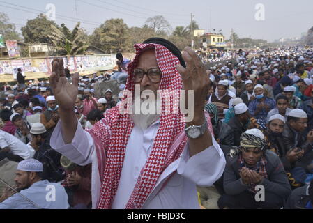 Bangladeshi Muslim devotee participates in Akheri Munajat, or last prayers, at the conclusion of the Biswa Ijtema or World Muslim Congregation at Tongi in Dhaka. On January 17, 2016  Islamic annual event Biswa Ijtema second phase ended with concluding prayer also knows as the Akheri Munajat, seeking spiritual well-being and welfare of the Muslim Ummah in Dhaka. Several millions devotees participated in the Akheri Munajat. Stock Photo